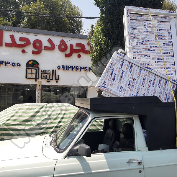 نمای ساختمان با پنجرههای مینیمال وین تک و شیشههای سکوریت | پنجره بالینکو